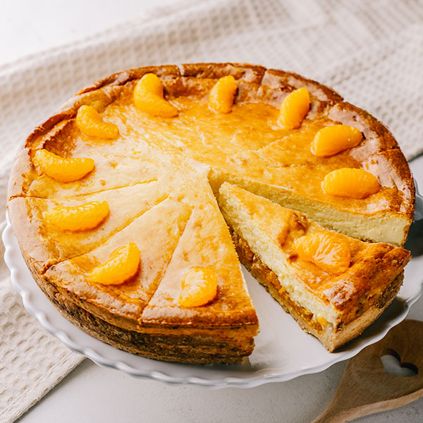 Omas Mandarine Käse ﻿Unser cremiger Klassiker verfeinert mit saftigen Mandarinenstücken.